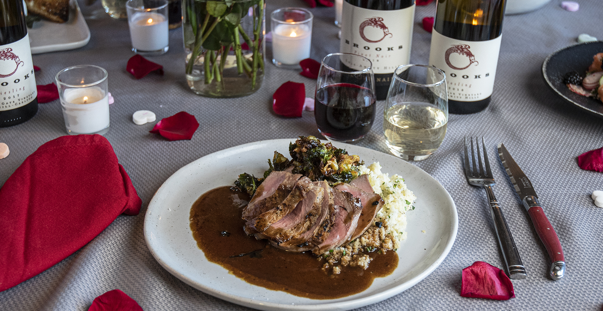 Roasted pork tenderloin with crispy Brussels sprouts & herbed couscous
